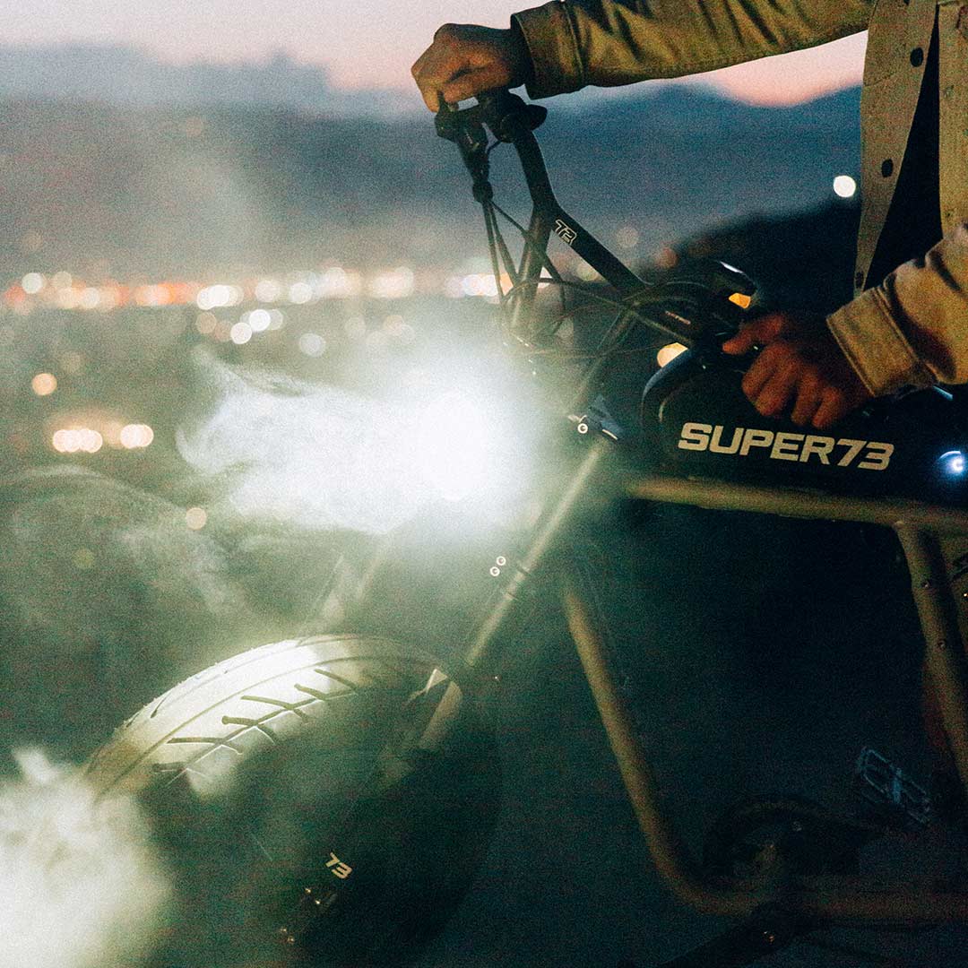 Super73 R Brooklyn ebike headlamp illuminating some fresh trail dust and sunset